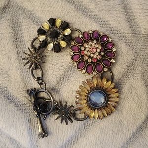 Lucky Brand metal toggle antiqued bracelet, shiney gems, purple,blue, blck&white